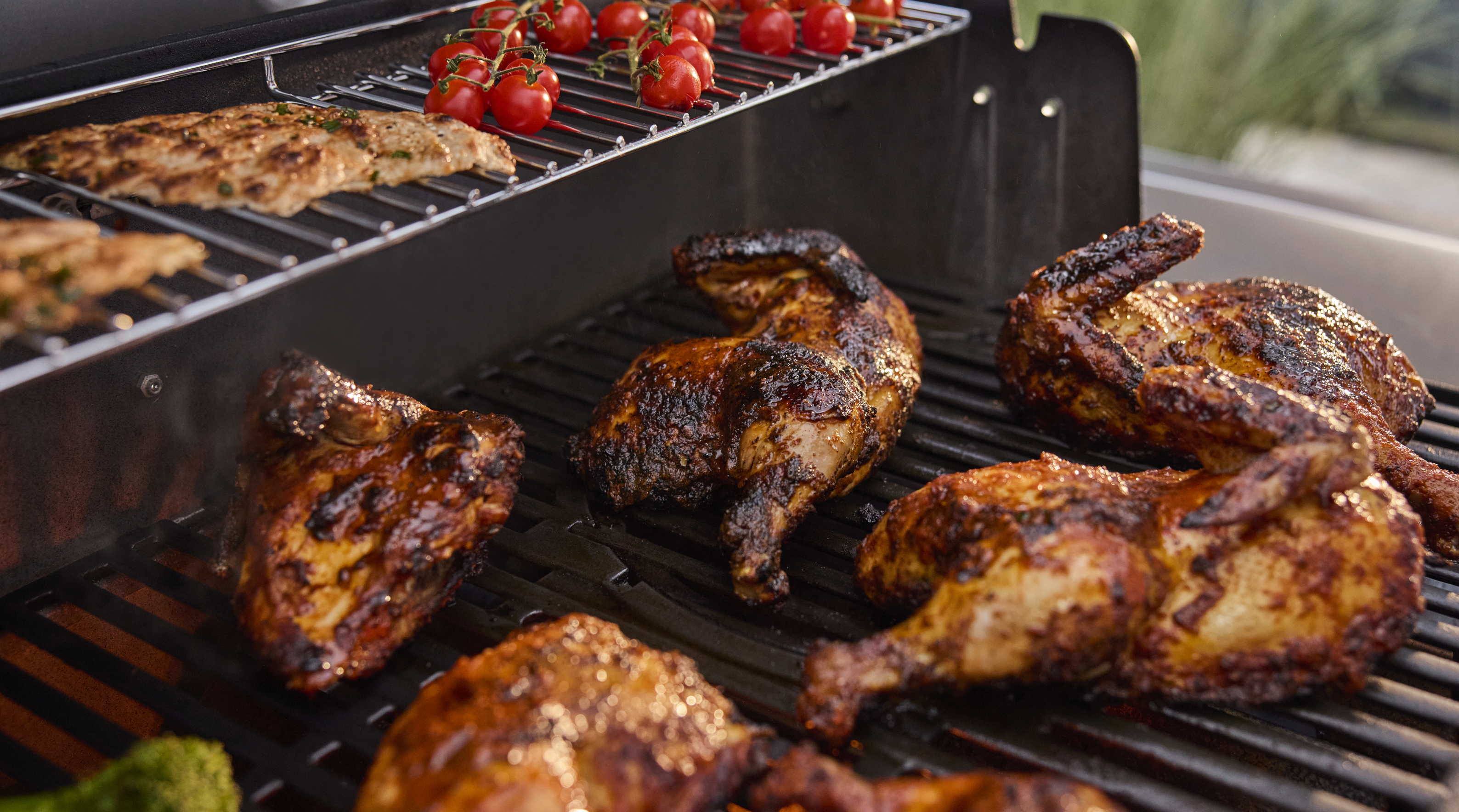 Genesis E-325W Gas Barbecue with Sear Zone Weber